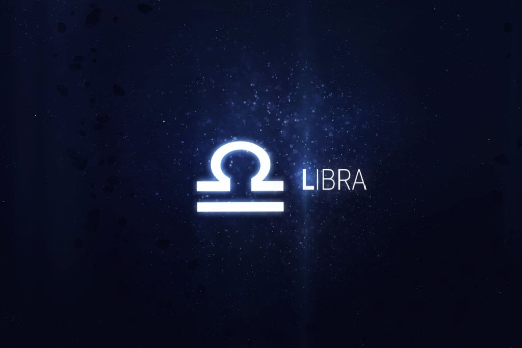 fundo azul brilhando com símbolo e nome do signo de libra